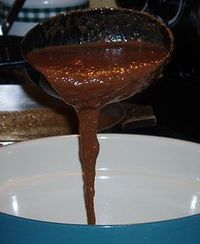 Learn how to make authentic mole sauce recipe. This recipe is my friend's grandmothers from Mexico. This recipe is made with fresh chicken broth and makes a very large quantity. People who like this sauce use it on many dishes so it really goes quickly. You can also freeze excess.