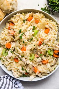 Just carrots, celery, onions and garlic flavor this soothingly simple, risotto-like creamy chicken orzo recipe. Grab some crusty bread and call dinner DONE.