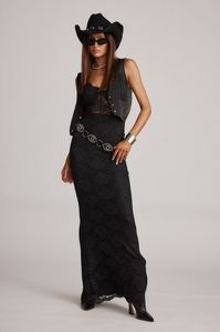 Introducing the Lizette Black Lace Maxi Gown. The sexy silhouette and black lace fabrication with a touch of sparkle is truly irresistible. Pair with the SCHUTZ Vikki Black Strappy Heel for a stunning look for your next evening event. STYLE RECOMMENDATIONS: - finish your look with the SCHUTZ Vikki Black Strappy Heel PRODUCT DESCRIPTION AND MATERIALS: - black maxi gown - sparkly black lace - elastic straps - lined bust and skirt - unlined bodice - 97% polyester 3% spandex - hand wash cold - hang