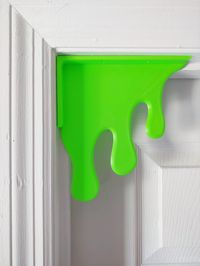 "Add some ooze to any room with these 3D printed \"Slime\" doorway decorations! Each measures 7\" x 7\" and are designed with 3 mounting holes fitted for #8 screws (Not included).  Though mounting hardware is small and minimally damaging to doorways, these decorations are more than light enough for picture strips or double sided tape for those not wanting to damage any fixtures.  Perfect for kid's bedrooms or playrooms or for adults who are kids at heart :-)"