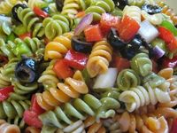 Zesty Italian Pasta Salad, love this salad. I use the tri color pasta w/ tomatoes, cucumbers, cheese, red onion, and the boys love pepperoni in it!