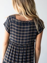 When you don't know what to wear, reach for our Berkley Maxi Dress! Just as comfy as it is beautiful this dress is made from soft, delicate plaid fabric that's tiered. We suggest sizing up in the Plaid Berkley for a more relaxed fit through the bust. This dress has a square neckline and a navy tan plaid print so you can just throw it on and go! Wear it with any shoe (we love it with a pair of boots to create an effortlessly cool, boho look) and layer it under a sweater or jacket on a chilly day!