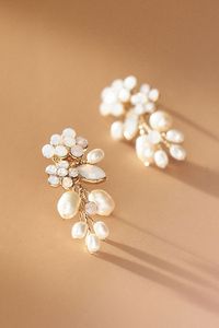 These hand-wired floral earrings feature freshwater pearls and glass crystals for the perfect amount of subtle sparkle.