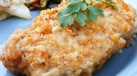 Pork chops coated with a crumbly cracker mixture and egg then baked.