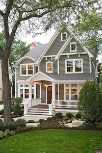 This front-gable home's wide front porch and rocking chairs speak comfort and serenity.