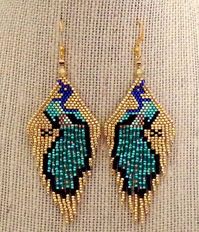 Colorful Peacock Bird dangle earrings. Glass and galvanized gold seed beads. Fringe dangle style. Handcrafted Southwest USA. Non-nickel gold plate hook ear wires. 3" long, 1 1/2" wide at widest part.