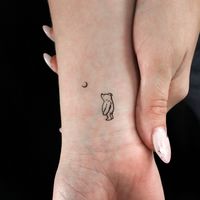 Pooh Bear and Moon temporary tattoo. Set of three. Size: 0.9 in / 2.4 cm (height) This temporary tattoo is: * Safe & non-toxic * Fun for all ages * Free shipping in orders over $10! * 20% off when you buy 3 items (+ Free Shipping), code: 3PLUS Temporary Little Tattoos last on average 2-5 days. We suggest placing on oil-free areas where skin does not stretch and keep them clean! Check us out! instagram @little.tattoos pinterest.com/littletattoos facebook.com/officiallittletattoos officiallittletattoos.tumblr.com twitter @little_tattoos Wholesale inquiries, custom designs, collaborations or ideas? Email us: ilove [at] littletattoos [dot] com