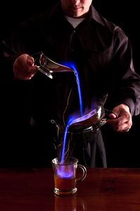 The Blue Blazer is one of the original flaming cocktails and is still considered a challenging drink to make. Master this classic blend with our recipe instructions.