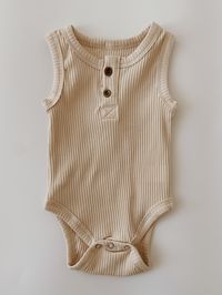 Our bodysuits are an essential, must-have piece for any babies closet.     • Size up, if in between sizes.      • Machine wash and hang or lay flat to dry.     • Tumble dry on low for a more snug fit.     • 95% Cotton 5% Spandex