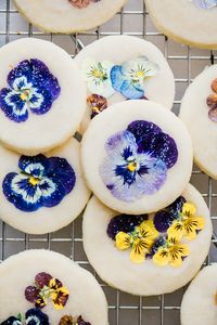 How to Make Pansy Topped Shortbread Cookies ~ easy shortbread cookies topped with delicate pressed edible flowers. The ultimate tea time treat! #easy #recipe #edibleflowers #afternoontea #shortbread #cookies #wedding #shower #dessert #shortbread #pressedflowers #pansies