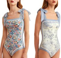 PRICES MAY VARY. The high-quality fabric makes the swimsuit very elastic, comfortable, quick-drying and breathable.which is safe and environmentally friendly. It feels comfortable and smooth. Retro and fashionable, simple and elegant swimsuit style is very suitable for every girl who pursues beauty. The one piece swimsuit is reversible which means you have two sides with different print to wear. The closure way is to tie knots on shoulders so you can tie a bow or other kinds of knots you want. D