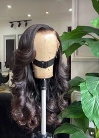 Body wave wig with bouncy curls and layers