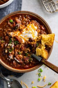 The best chili I have ever made! It's packed with ground beef, bacon and 3 kinds of beans with just the right combination of spices for the perfect flavor! Top it off with a little sour cream and shredded cheese, Yum! #recipe #chili #ground beef