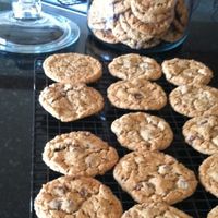 This is how I get rid of our extra plain, boring shredded wheat that no one really wants to eat. They are crunchy, but still soft. To my taste buds, they fashion a taste somewhere in between peanut butter cookies and oatmeal cookies, but with a crunchy aspect to them, paired with a hint of chocolatey goodness. The baking time is for a couple batches, but it will vary depending on how big your oven and/or baking sheets are.