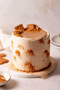 This Biscoff cookie butter cake is packed with rich and creamy speculoos spread! With a heavenly fusion of fluffy vanilla cake layers, Biscoff cookies, and Biscoff buttercream, it truly is cookie butter heaven! | Cambrea Bakes