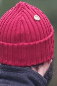 Wool beanie outfit for Men. Burgundy sustainable merino wool beanie with a metal button for Men women and kids.