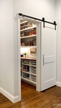 I used a couple of IKEA cabinets & some wood from Lowes to create this custom pantry. Get the details at StacysSavings.com!