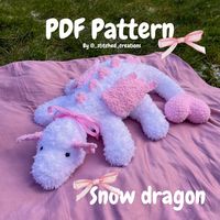 This is a DIGITAL PDF PATTERN not a physical plushie, to order a finished plushie please visit my Etsy shop Purchases will be available to instantly download and can be accessed on your Etsy profile (you CANNOT access files on the app only on Etsy.com) This adorable pattern is inspired by the jellycat snow dragon complete with a cute bow detail There are photograph instructions in the pattern to show how to make the wings and ears! The pattern also includes multiple detailed photos of different