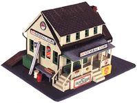 You'll find everything from kerosene lamps to a friendly game of checkers at the General Store. A great building for a quiet country crossroads, includes front porch and other details. 6 x 4-7/8" HO Scale NOTE: Unless specifically indicated above, structure kits and built-ups do not include any pictured figures, vehicles, scenery, track, or trains. These are included in manufacturer provided images to demonstrate how the product may be used on your layout. Life-Like - General Store -- Kit - 6 x 4-7/8" 15.2 x 12.4cm - HO Product Info: Scale: HO MSRP: $27.98 Our Item Number: 433-1351 Category: HO Scale Town / City You'll find everything from kerosene lamps to a friendly game of checkers at the General Store. A great building for a quiet country crossroads, includes front porch and other deta