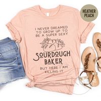 This cute and funny homesteader design will make a perfect gift for any baker, homesteader or mom. Weather it is a baking quote or cute design it is guaranteed to make them smile! We have a selection of T-shirts, tank tops, sweatshirts or totes with various baking designs that will make a perfect gift for anyone. ◆ Thank you for shopping with us! We hope that your purchase made someone smile! Please, leave us a review to share your experience with others. This t-shirt is everything you've dreame