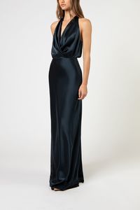 Plunge neckline halter gown in pure silk charmeuse. Features a full length bias cut skirt with an invisible zipper closure at back. Made in USA.    Composition: 100% silk