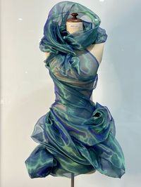 Metalic draped gown by John Azzi