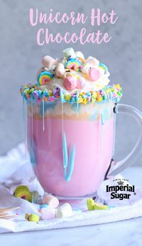 Unicorn Hot Chocolate-A magical pastel rainbow of color, fluffy mini marshmallows and a warm and creamy white chocolate make this Unicorn Hot Chocolate the stuff of little girls' dreams. This quick and easy recipe would make a great surprise beverage for a cold winter day or a tasty sweet treat for a special birthday party or celebration. It's the perfect warm drink dessert for a sleep over slumber party. It even makes a great addition to a spring Easter party or celebration.