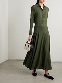 Loro Piana's maxi skirt is designed in a dark-green shade the brand likens to that of 'Sencha' tea. Cut in Italy in an A-line style from airy wool-crepe, it has gathers to emphasize its floaty movement. The full crepe de chine lining feels smooth against your skin.