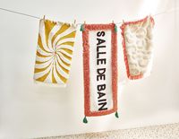 Step out of the shower onto soft cotton with our collection of bath mats. In plush finishes to catch every drip and drop, these fun bath mats add a bright splash of colour to instantly uplift your bathroom. Choose a bright pattern or striped bathroom mat, or opt for a slogan bath mat that makes a statement.