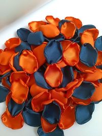 Burnt orange rose petals for you rust orange wedding or other important event for you! They are so similar to real ones that they can hardly be distinguished. These rose petals are made of satin. They are carved by hand and scorched to prevent fraying, and each of them is approx 1.5 - 2.2 inches. These navy blue copper petals are ideal for weddings, baby showers or birthday parties, for home decoration for any occasion. You will be delighted! The approximate quantity of petals you will need for