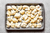 cauliflower florets on the tray.