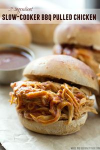 This simple BBQ pulled chicken cooks entirely in the crockpot and hungry game-day guests won't believe that it comes together with only 2 ingredients! @WholeHeavenly