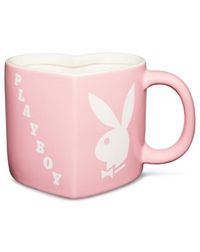 Love Playboy? Of course you do! Show off one of your favorite brands with this cute pink Playboy heart-shaped coffee mug. It's sure to make you smile with every sip! Officially licensed Exclusively at Spencer's Dimensions: 3.9" H x 6.3" W x 4.1" D Capacity: 22 oz. Material: Ceramic Care: Dishwasher safe Microwave safe Imported