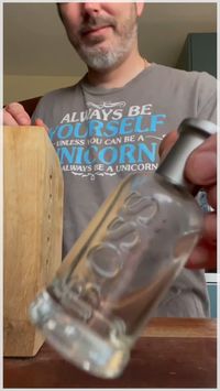 A man who upcycles empty bottles into perfect drinking glasses transformed an empty bottle of aftershave into a super-cool shot glass!