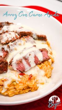 When it comes to Mexican cuisine, there's no shortage of delicious options, and today, we'll be diving into a delightful trio of flavors most Mexican restaurants call Arroz Con Carne Asada: Mexican Rice, Steak, and Queso. While arroz con pollo AKA acp is a fan favorite for so many, this steak version is sure to be a favorite too.