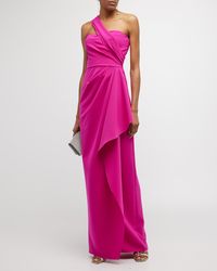 Find RICKIE FREEMAN FOR TERI JON One-shoulder Draped Stretch Crepe Gown on Editorialist. This Rickie Freeman for Teri Jon asymmetric gown is crafted from stretch crepe. It features a one-shoulder neckline, a sleeveless silhouette, a pleated front, and a floor-length hem. The gown has a center back zipper closure. It is made from a polyester and polyurethane blend. This gown is perfect for a special occasion.