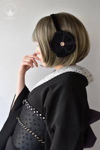 Keep Your Ears Warm With These Chic Camellia Earmuffs - 9GAG