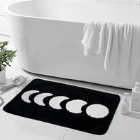 PRICES MAY VARY. 🌜Boho Bath Rug🌛: Our moon-phase rugs, in an abstract Bohemian Moroccan art style, vividly show the process of the gradual moon in black and white tones, which is the first choice for your bathroom decoration; It meets the needs of lovers of Bohemian, gothic, witch, hippie or other urban decor. 🌜Microfiber Material🌛: The bathroom rugs is made of 100% microfiber material, which makes your feet feel very soft and comfortable. The appropriate length of fluff gives you a better e