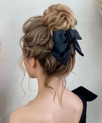 High Messy Bun with a Bow