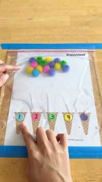 An engaging counting activity that promises heaps of fun for your little ones! Watch as they practice counting, learn colour matching, hone their fine motor skills by sorting pompoms onto the corresponding ice cream cones.  🌟 Get this free ice cream cone printable on Happy Tot Shelf blog!