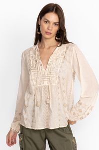 Truly bohemian in nature, the Charis Prairie Blouse is a testament to free-spirited style. Crafted from 100% cotton and finished with a tie-front neckline, this blouse is equal parts classic beauty and casual comfort. Pair with earthy tones and casual pieces for an easy warm-weather ensemble. Product Details: 100% Cotton Embroidered Tie Front Neckline with Tassels Model Height: 5'9" Model is wearing a size Small Measurements for size Medium: Bust- 44 1/2", Length- 28" Have questions about fit or