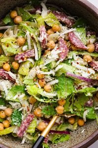 Fresh and flavorful, La Scala Salad is a copycat recipe of the famous Italian chopped salad served at La Scala restaurant in Beverly Hills. Rumor has it, Kim Kardashian orders this salad often, and for good reason! It's packed with delicious ingredients and crunchy texture, thanks to the chickpeas, salami, mozzarella cheese, and a zesty red wine vinaigrette.