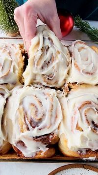 These Jumbo Cinnamon Rolls taste just like Cinnabon, but better! Soft, fluffy layers of sweet dough is wrapped around plenty of brown sugar cinnamon filling. The extra cinnamon filling creates a gooey sauce on the bottom of the cinnamon rolls when baked. These are slathered with a melt in your mouth cream cheese frosting, that...