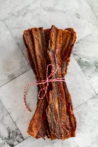 Maple Sriracha Bacon Jerky recipe where sweet meets spicy and savory in this tasty twist on classic jerky. A must-try for bacon enthusiasts!