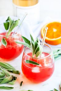 Sage Ginger Blood Orange Fizz Cocktail - A twist on the classic bubbly beverage with homemade sage ginger syrup. Choose between a vodka fizz or a gin fizz depending on taste! #sage #ginger #bloodorange #fizz #vodka #gin #cocktail #beverage #drink #happyhour #recipe #simple #syrup