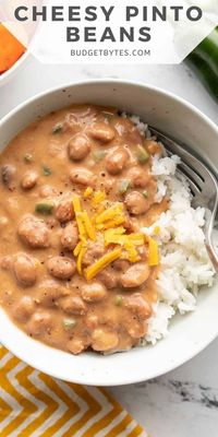 Cheesy Pinto Beans are a quick and satisfying meal made with simple pantry staple ingredients, like canned beans.