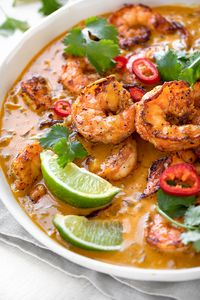 This coconut curry shrimp is mildly spicy and creamy, and brimming with Thai-inspired flavors such as curry paste, lemongrass, and ginger! | thecozyapron.com #coconutcurryshrimp #coconutcurryshrimprecipe #coconutcurryshrimpeasy