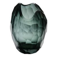 Handmade by the expert glassmakers of Artel, this exquisite vase features hand-cut facets that reflect light and create unique patterns. Reminiscent of natural ice formations, this thick glass vase adds sculptural presence to a table, shelf or desk. Use it as a living room vase for an oversize floral arrangement to create an vibrant and alluring focal point.