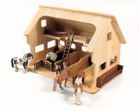 Wooden toy farm for domestic animals which is finished with natural oils and beeswax.