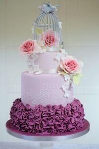 Plum bird cage wedding cake